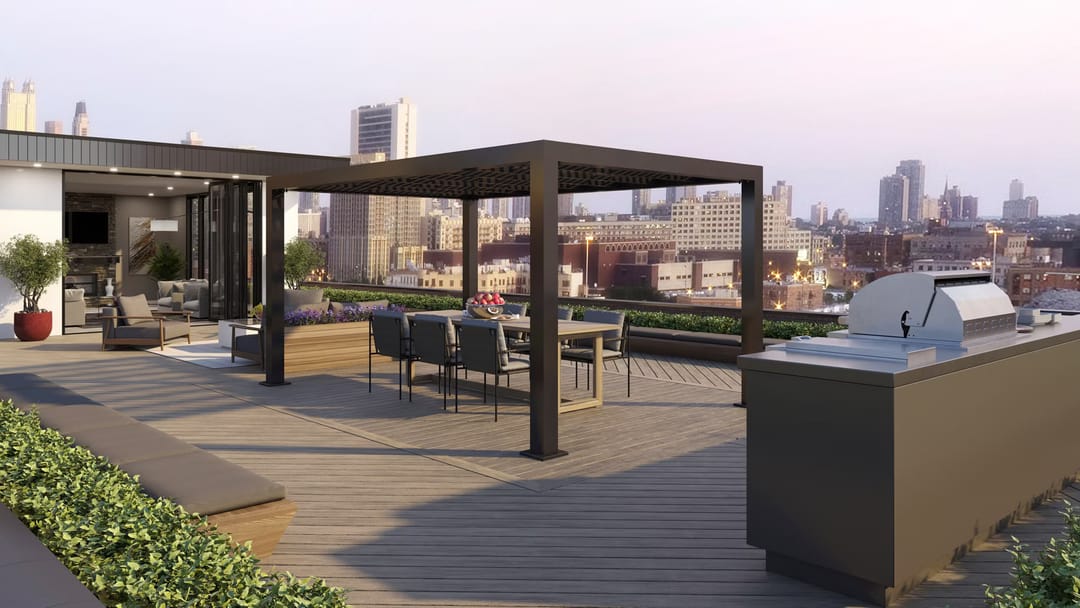 Computer-rendered rooftop deck in Lineage Biscayne with a black pergola, dining table and outdoor kitchen against a city skyline