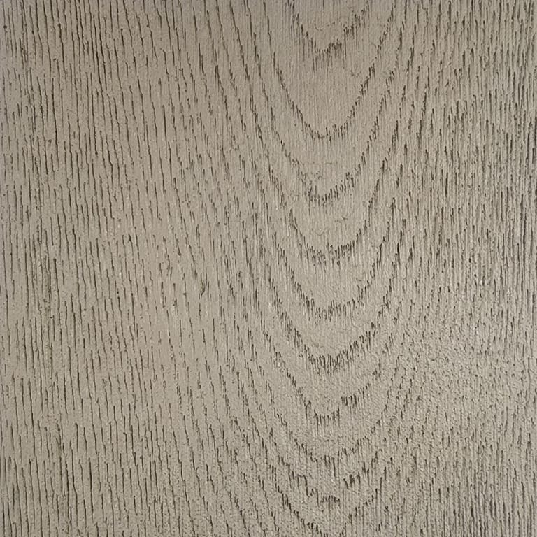 Full-frame close-up of an INNODECK board in Natural Oak, a light greige surface with deep embossed oak grain