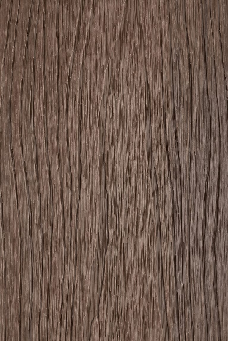 PermaTimber 146 CX decking board face in Rosewood, a mid reddish-brown, shown as a tall swatch with flowing embossed grain