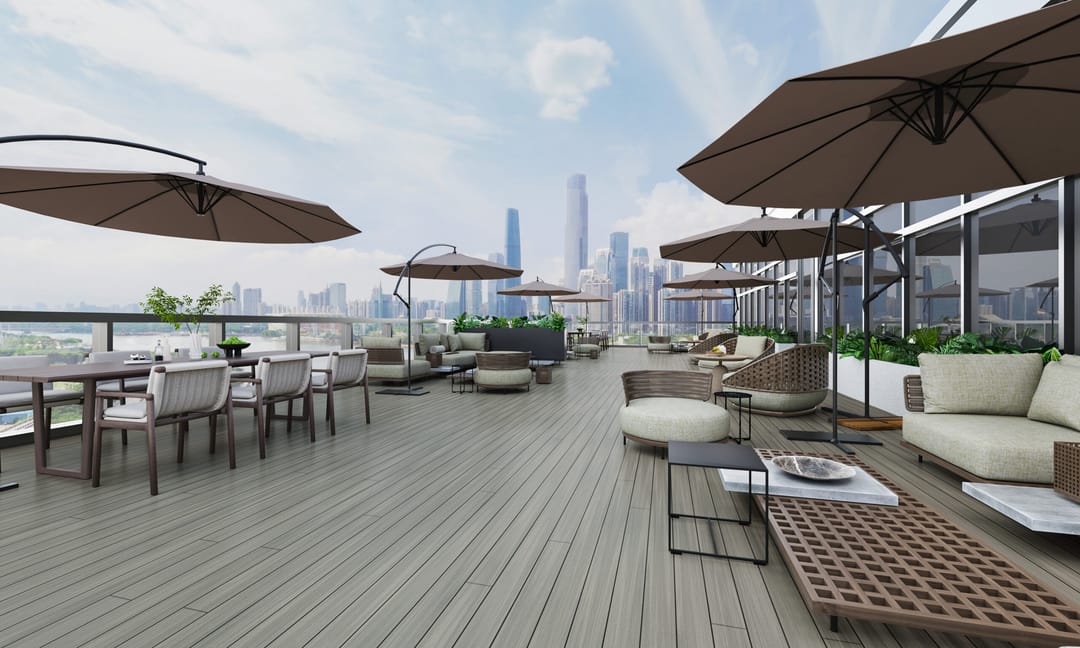 Computer-rendered rooftop terrace decked in NewTechWood Soho Grey Ironbark with umbrellas and lounges, city skyline