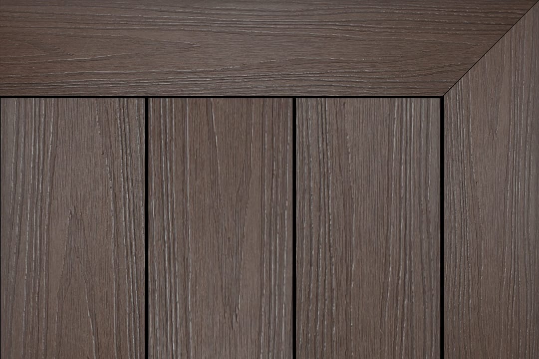 Brite HD Urban X composite decking in Dark Wood: dark brown wood-look boards inside a mitred picture-frame border