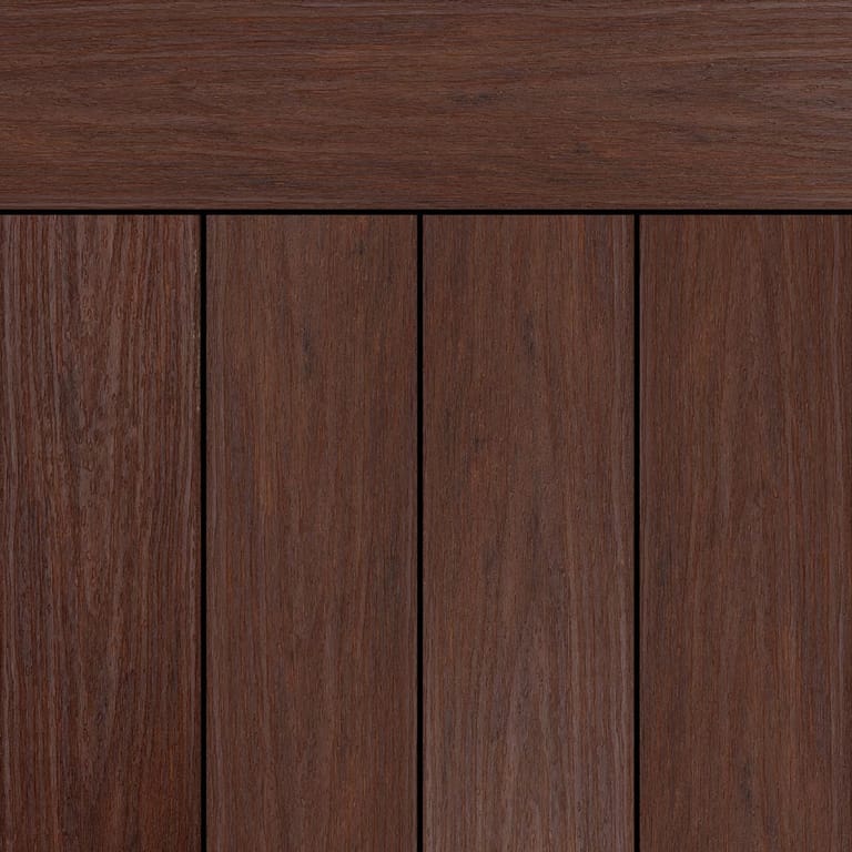 OneDeck SnapDeck Mallee Bark PVC deck boards laid side by side under a matching fascia, in deep reddish brown