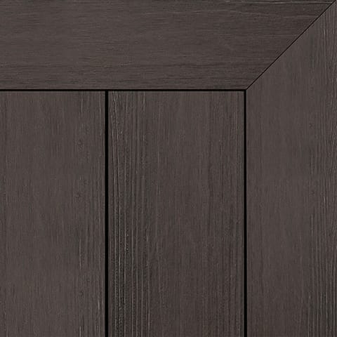 Close-up of Brite NextGen Titanium composite deck boards in Umber, a dark umber-brown grain, with a mitred picture-frame corner
