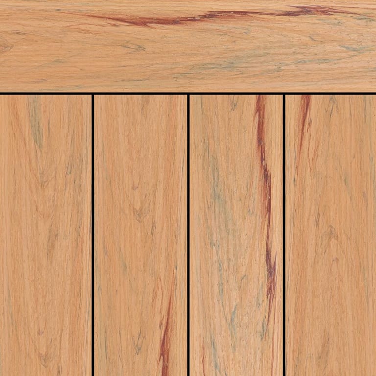 OneDeck SnapDeck Wild Shore PVC deck boards laid side by side under a matching fascia, in light tan with red and grey streaks