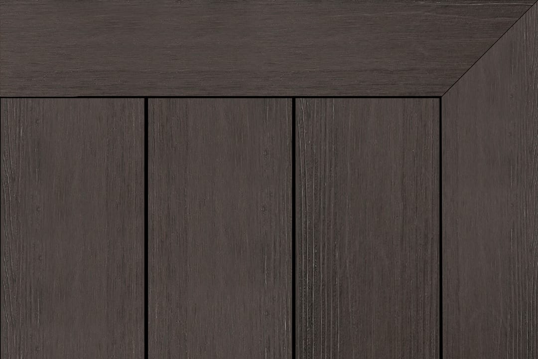 Brite NextGen Titanium composite decking in Umber: dark umber brown boards inside a mitred picture-frame border
