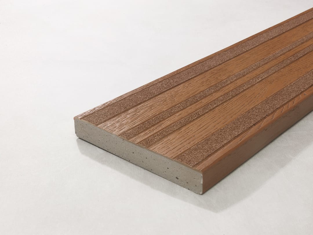 Single Millboard Lasta-Grip board in Coppered Oak, copper brown with its grooved anti-slip surface, shown at an angle