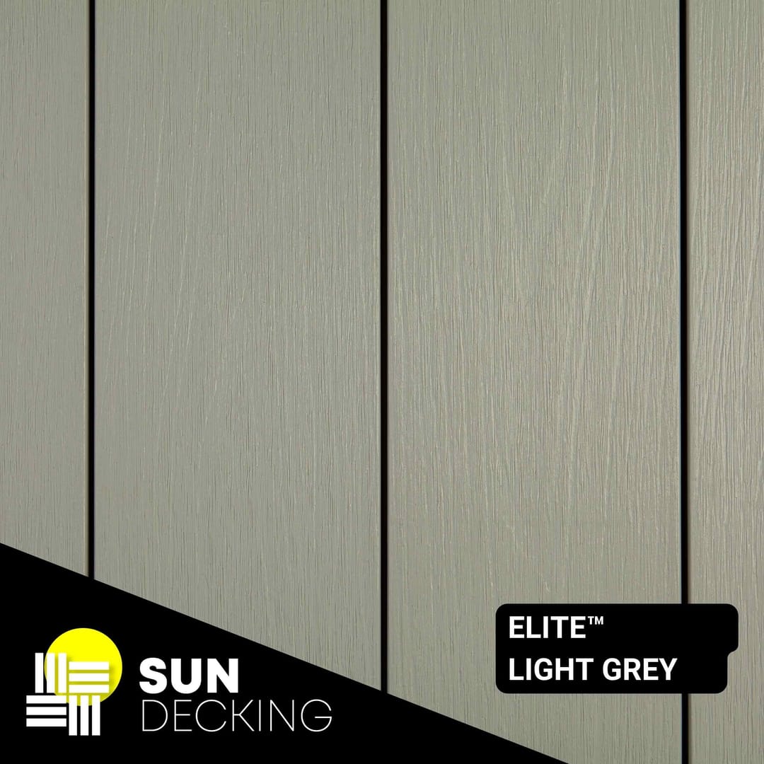Sun Decking Elite composite boards in Light Grey laid side by side, a pale grey streaked woodgrain finish, with the Sun Decking logo