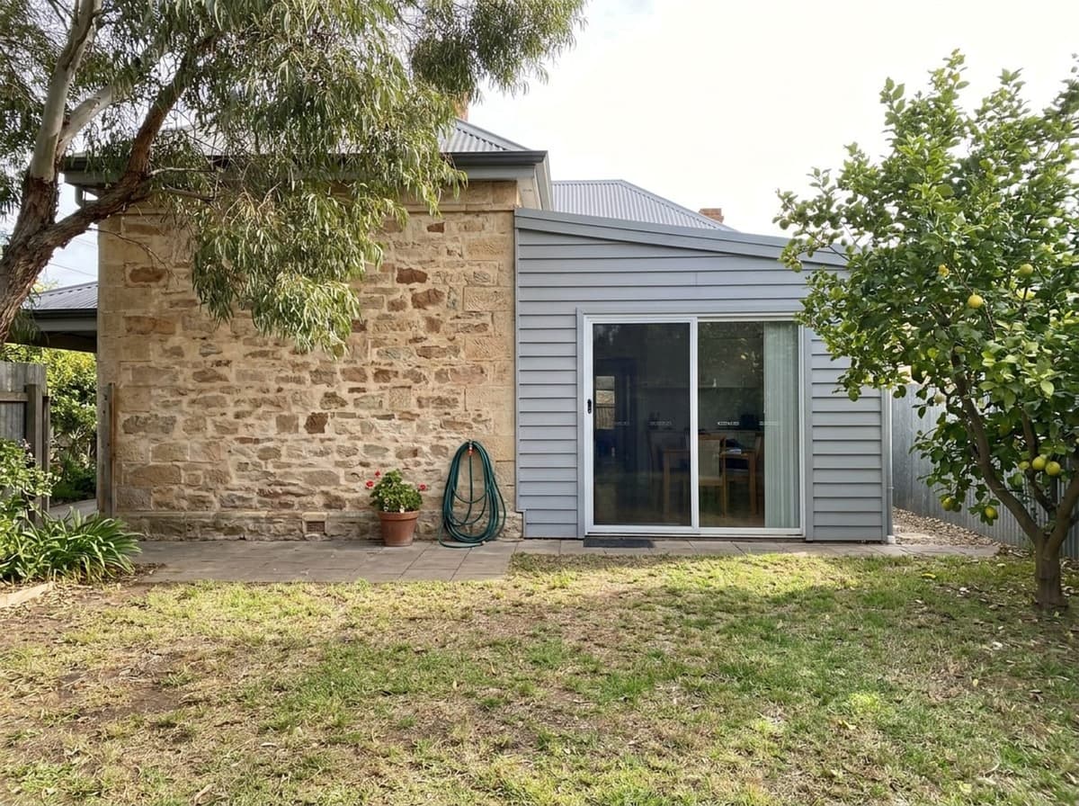 AI-generated photo of the back of a sandstone villa in Adelaide, before the deck